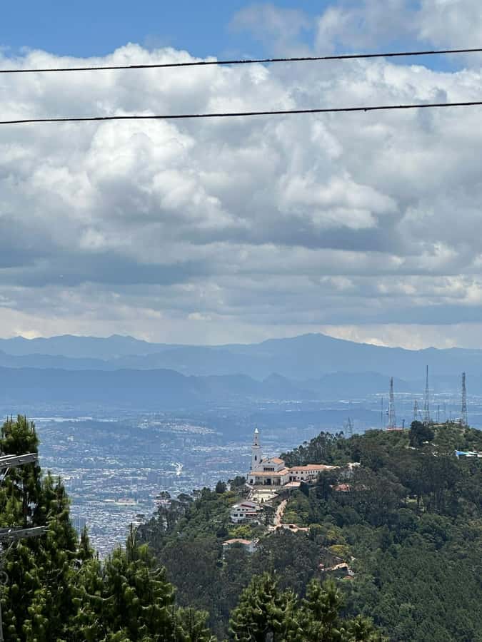 Bogotá: Visit Colombia's Highest Waterfalls & Guadalupe Hill - Feeling the spray at the base