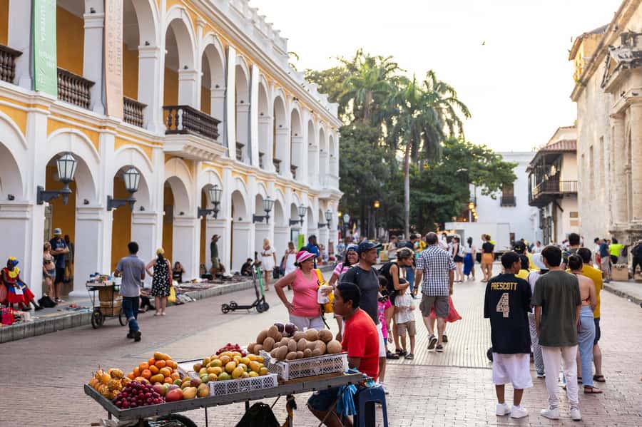 Cartagena: Guided Street Food Tour with Tastings - Meeting beneath the orange umbrella at Plaza Cervantes