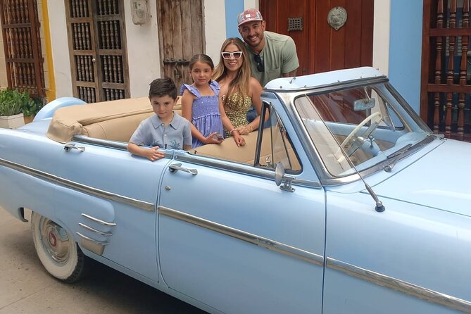 Cartagena Luxury Classic Car Tour + Bilingual Historian Guide - The Adolfo Mejía Theater and cathedral