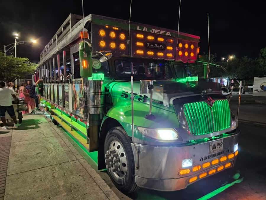 Cartagena: Night party in authentic Colombian chiva with entertainer - The first ride gives you Cartagena after dark