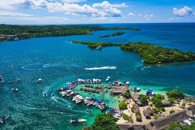 Cholon The party island, with DJ on board - Meeting at Muelle de los Pegasos near the Clock Tower