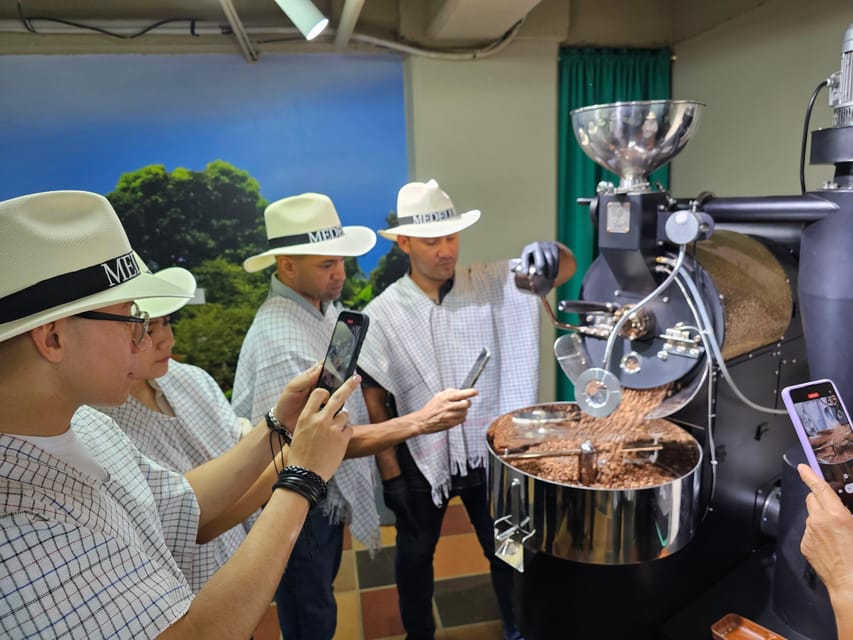 Coffee Experience with roasting show in Comuna 13 - Touching the coffee fruit before tasting the bean
