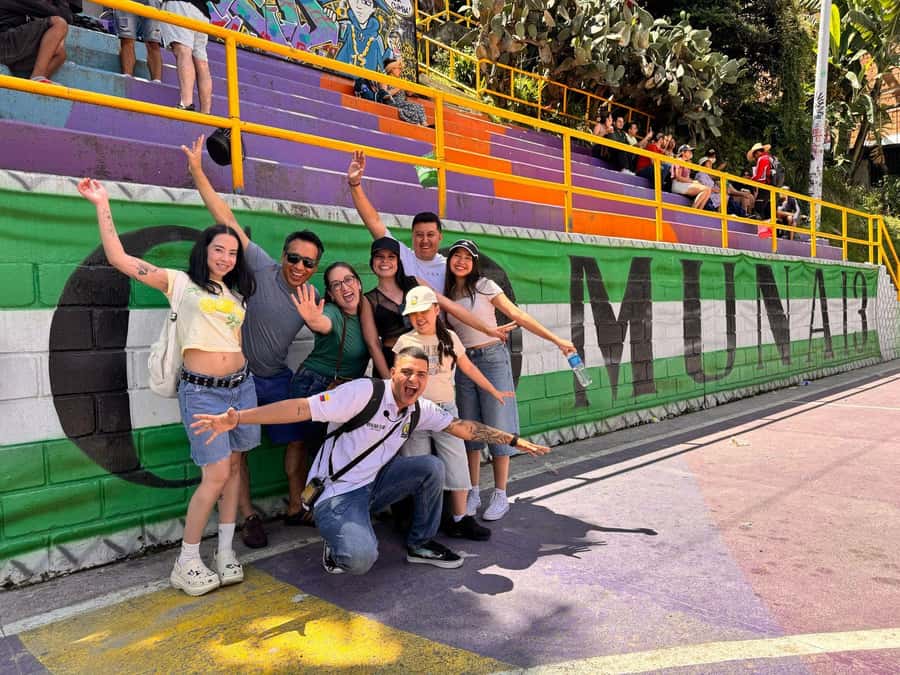 Complete Tour in Comuna 13: Graffiti, History and Street Delights - Getting to the green umbrella at San Javier