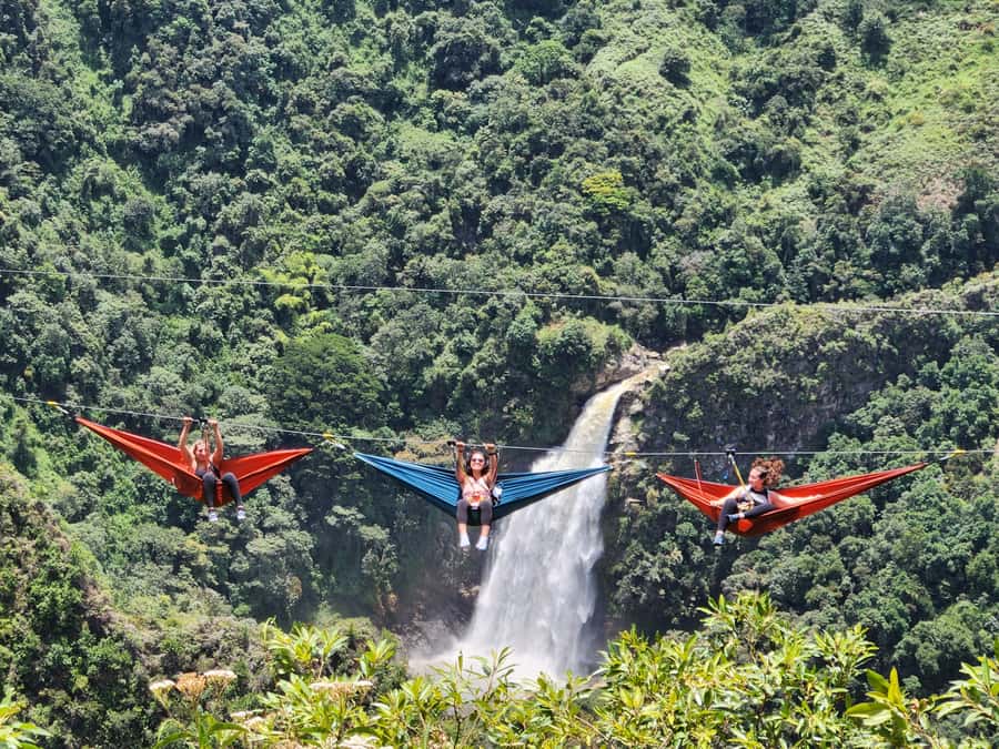 From Medellín: Dream Hammocks, Zipline, & Waterfall Day Trip - From Medellín to La Ceja, the city fades fast