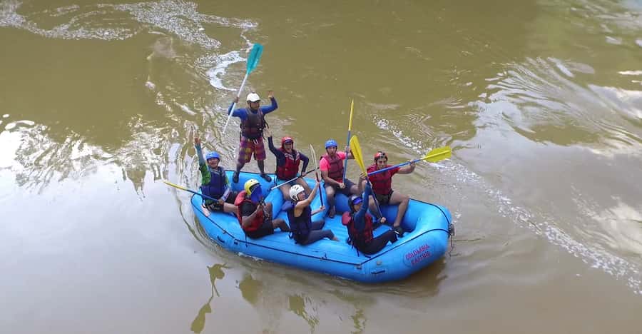 From Medellín: Paragliding and Rafting Combo Tour - Taking flight above the canyon
