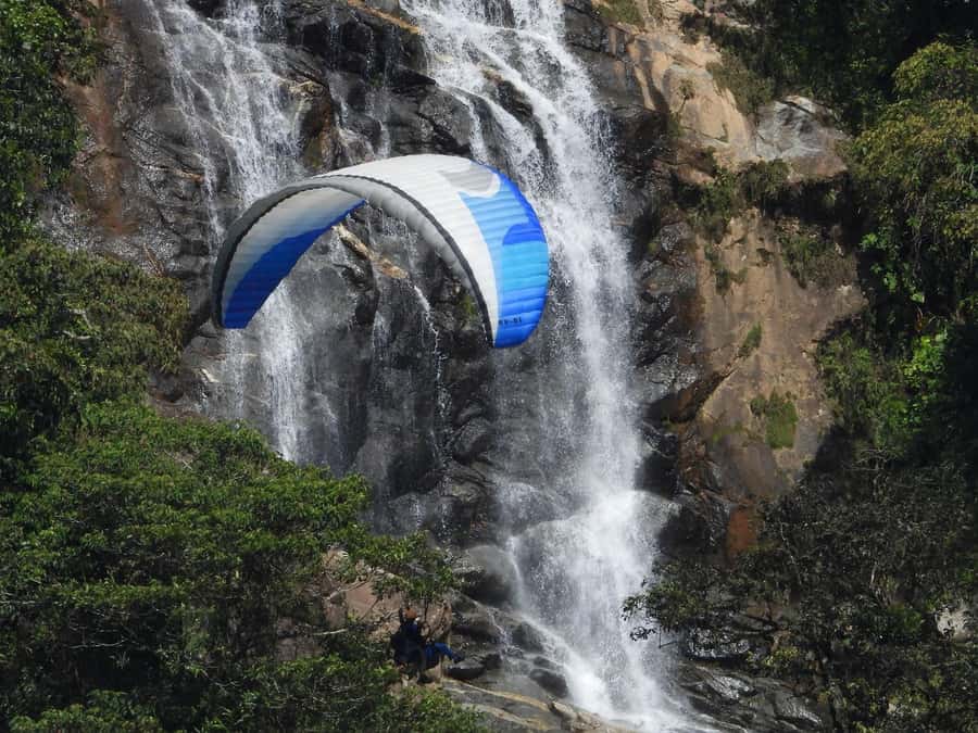 From Medellín: Paragliding Flight and Guatape Tour - The paragliding flight over Cocorná