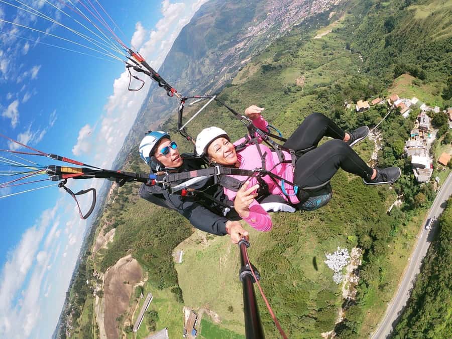 From Medellín: Paragliding Tour with GoPro Photos & Videos - Check-in, instructions, and the climb uphill
