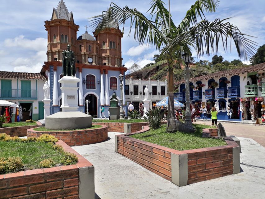 From Medellin: Private Guatape Car Tour with Coffee Tour - Walking through Guatape’s painted center