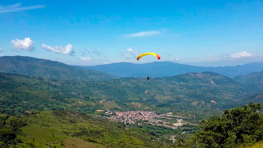 From Medellin: Private Paragliding Tour Over Waterfalls - The Mountain Restaurant Stop on the Way Back