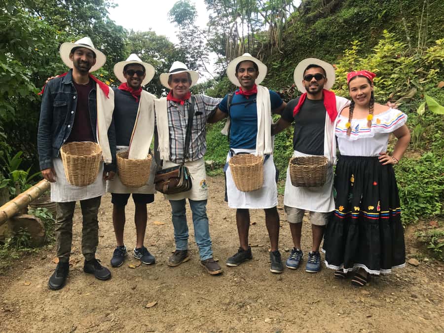 Medellín: Guatape Village with Coffee and Fruit Tasting Tour - Guatapé’s color and carved details