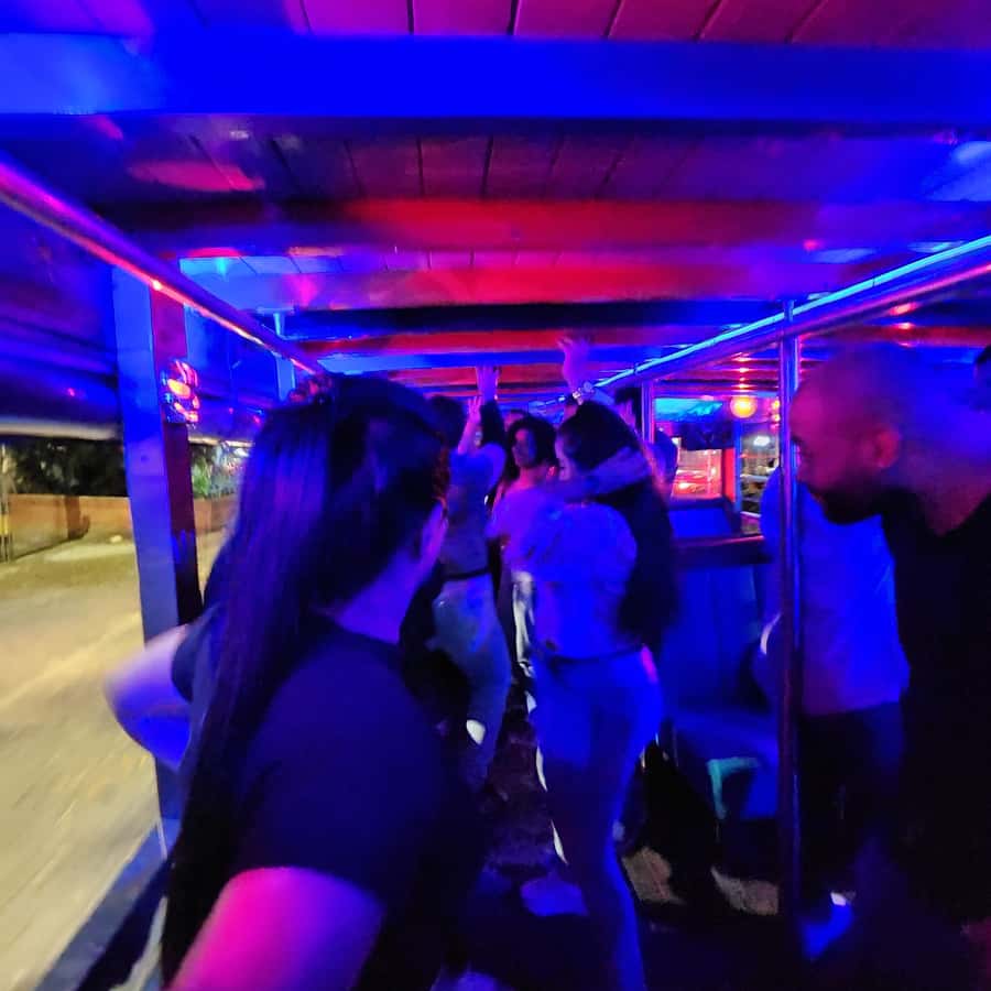 Medellin: Party Bus with DJ & Street Food Tastings - The illuminated 4 Sur Bridge photo stop