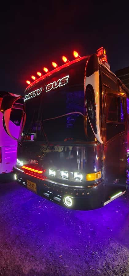 Medellin: Rumbero Party Bus with all the beer you can drink - Milla de Oro Avenue and the polished side of Medellín
