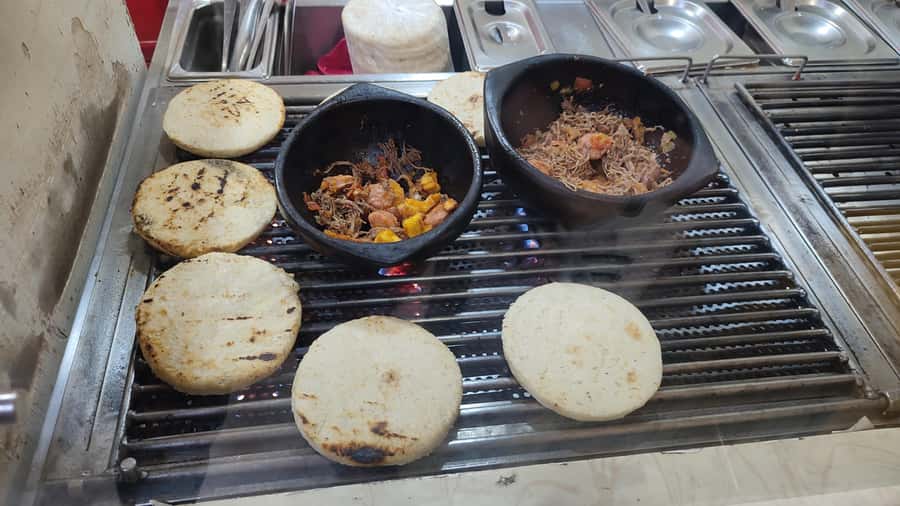 Medellin: Street Food and Poblado Rooftop Tour with a Local - What the guides add to the evening