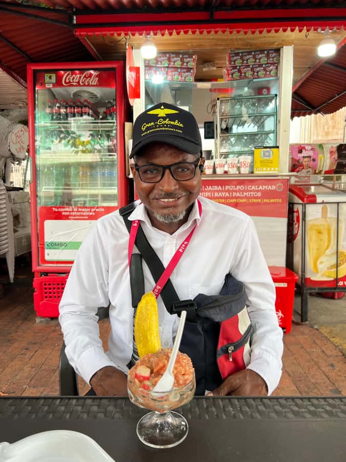Private Street Food Tour in Walled City and Getsemani - Trying arepa de huevo and carimañola