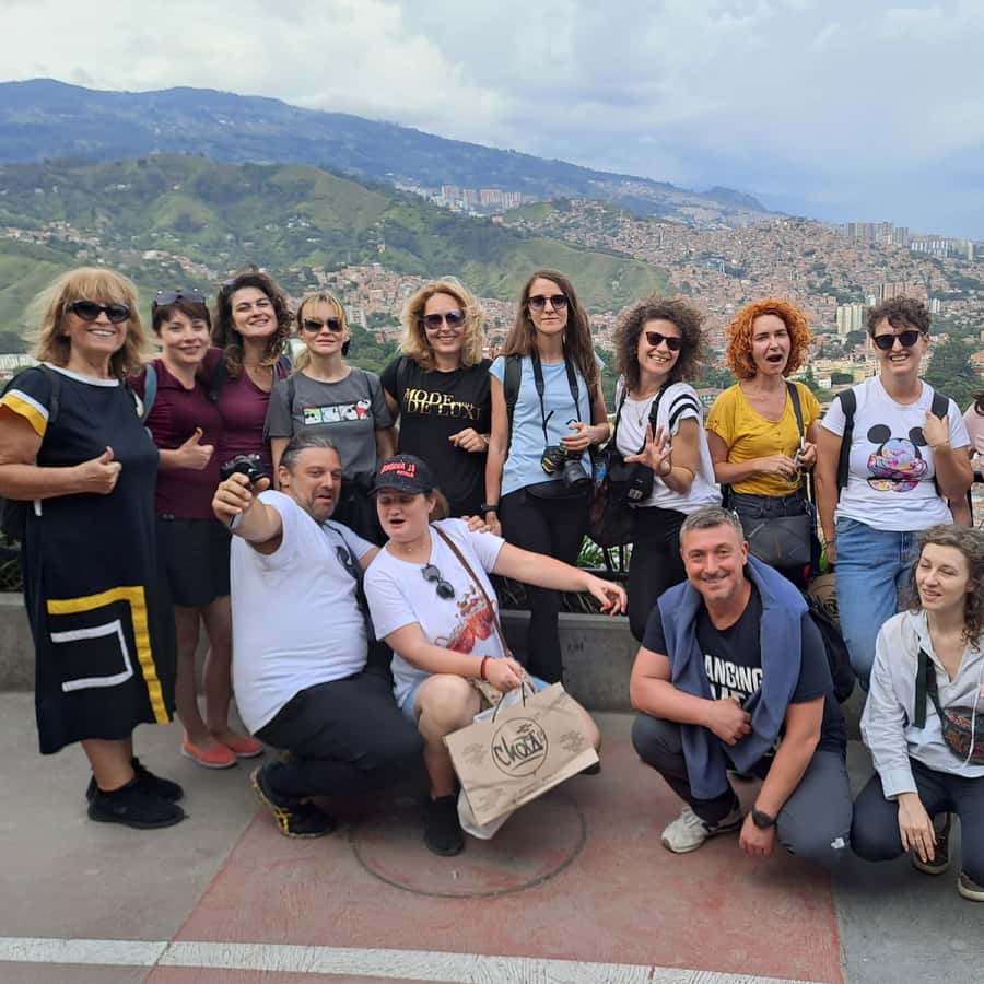 Shared Tour to Comuna 13 & Aurora Cable Car in Medellin - The physical side: steep streets, sun, and rest stops