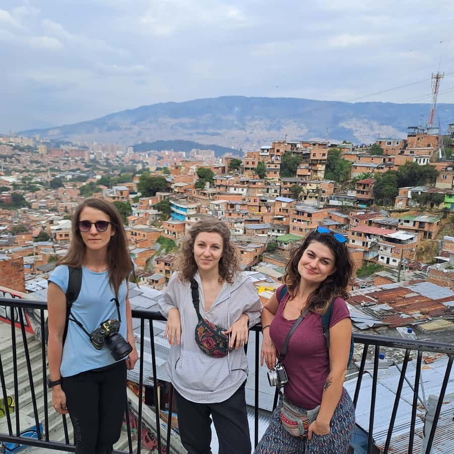 Shared Tour to Comuna 13 & Aurora Cable Car in Medellin - Walking the murals and narrow hillside routes